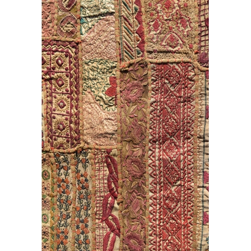 153 - IndianA patchwork wall hanging, with mirror pieces detailing and gilt threadDimensions:102 in. (L) x... 