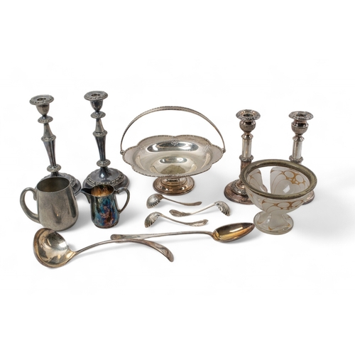 189 - A large lot of silver plate, to include two candlesticks by Harrods, a bowl, five spoons, two furthe... 