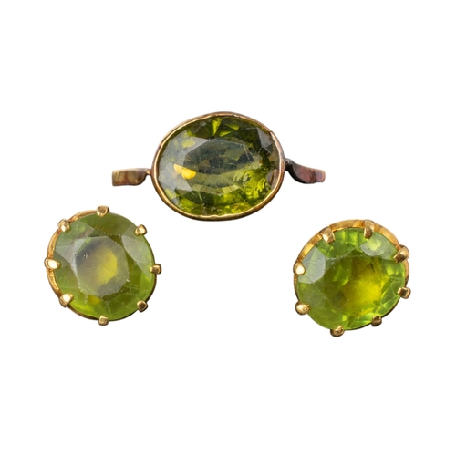 2 - ContinentalCirca 1930A pair of peridot and yellow gold ear studs and ringThe mixed cut peridot withi... 