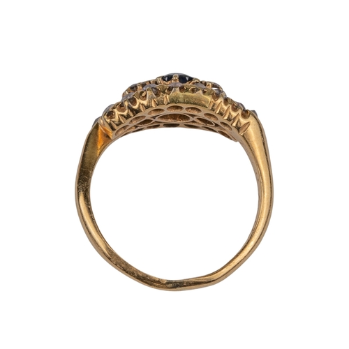 32 - British19th CenturyA sapphire and diamond crossover cluster ringMounted in yellow gold Ring siz... 