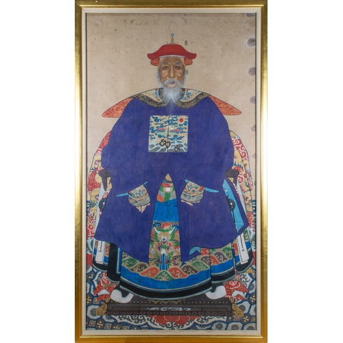 369 - Chinese19th century, Qing dynastyA pair of ancestor portraits of a high ranking civil official and h... 