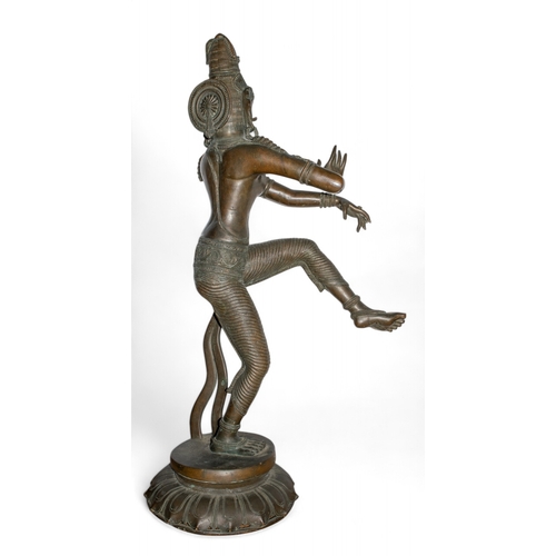 393 - South IndianA large dancing goddess, possibly ParvatiBronzeThe right hand raised in abhaya mudra (gi... 