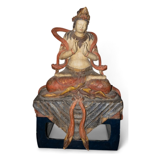 396 - Chinese18th Century or earlierA large and rare carved painted wood figure of Kuan Yin, the Bodhisatt... 