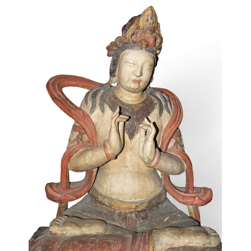 396 - Chinese18th Century or earlierA large and rare carved painted wood figure of Kuan Yin, the Bodhisatt... 