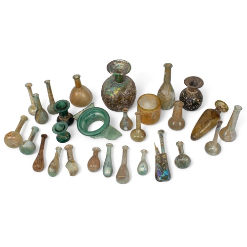 397 - Roman1st/2nd Century28 Unguentaria glass vases and fragmentsDimensions:Ranging from: 7 in. (H) x 5 i... 