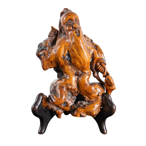 398 - JapaneseA carved fishermanBurr or driftwoodProperty of a gentlemanDimensions:5 in. (H)... 