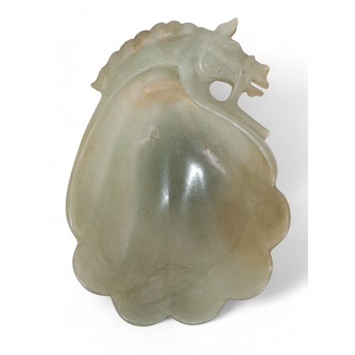 403 - A jade wine cup, with a modelled a horse headDimensions:3.5 in. (H) x 9.5 in. (W) x 6.5 in. (D)... 