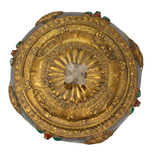 411 - Tibetan, 19th CenturyA rock crystal and gilt silver extensively carved bowl with cover and inset tur... 