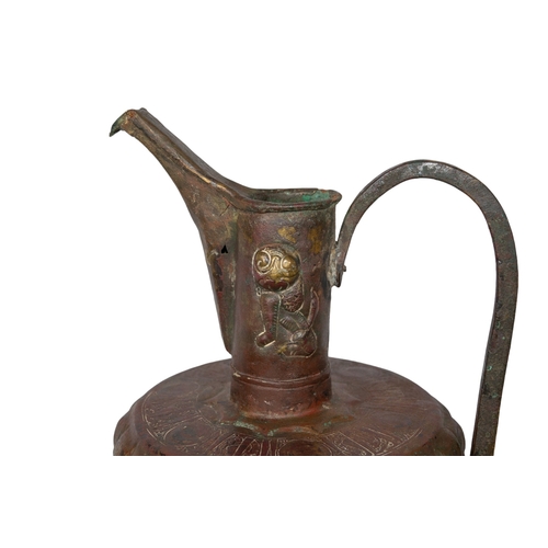 423 - Persia12th century (?)A Khorasan copper inlaid bronze ewer, of slightly flaring lobed form on a spla... 