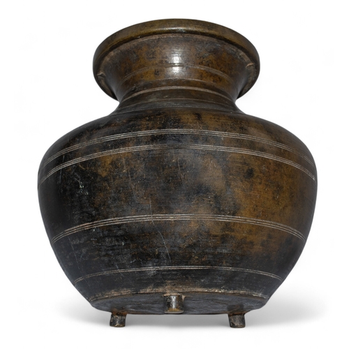 426 - Antique, Indian (?)Bronze vase on three feet, with incised line decorationDimensions:6.5 in. (H) x 6... 