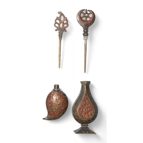 430 - Indian19th centuryA lot of two kohl holders, in brass, one mango-shaped Dimensions:[a] 4 in. (H)[b] ... 