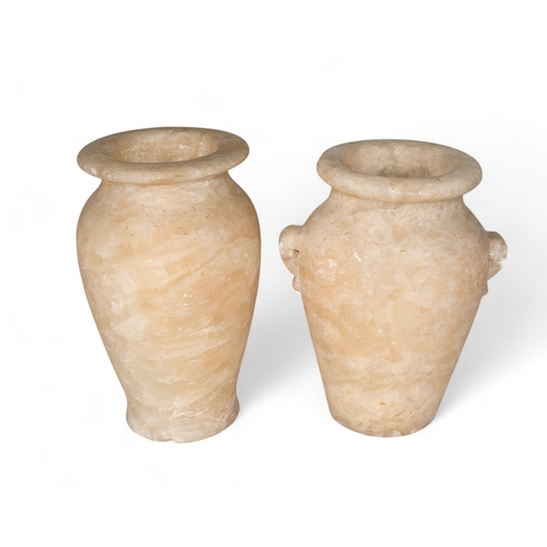 431 - EgyptianNew Kingdom (?)Two alabaster jars with everted rims, the smaller with a pair of pierced side... 