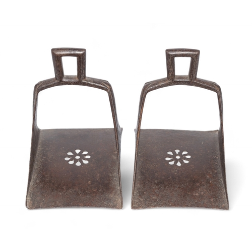 441 - Islamicc.1800A pair of wrought iron stirrups, with pierced central medallion To be sold without rese... 