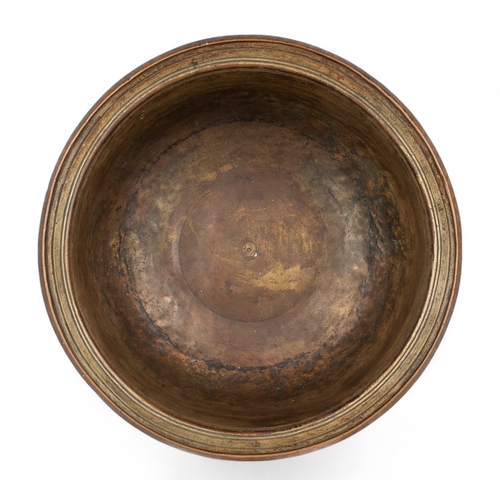 468 - Persian (?)16th century (?)A large copper wine basin, extensively engraved and inlaid with black com... 