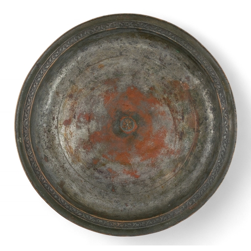 470 - Persian, Safavid (?) A large and shallow tinned copper bowl, with a fine and small central medallion... 