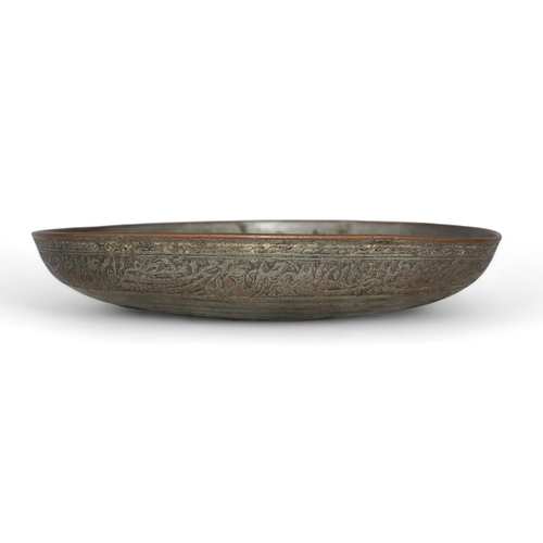 471 - Persian, SafavidA shallow tinned copper bowl, with inscription to exterior rim and an interior centr... 