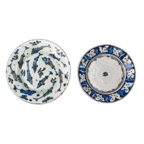 476 - Persian, QajarTwo small decorated plates, in white and blueDimensions:[a] 8 in. (D)[b] 7 in. (D)... 