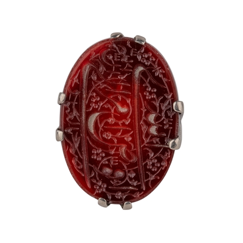 49 - Middle EasternMid-19th CenturyA carnelian intaglioThe oval shaped intaglio very finely engraved with... 