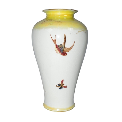 498 - BritishA porcelain Chinese-style vase decorated with birds and butterfliesTo be sold without reserve... 