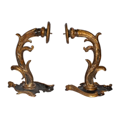 502 - Continental school19th centuryA pair of baroque style wooden sconces, with polychromeTo be sold with... 