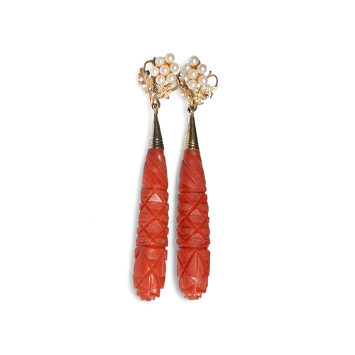 51 - ContinentalAntiqueA pair of carved coral pipkin drop earringsWith later cultured pearl and gold fine... 