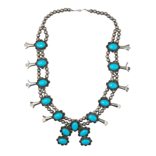 55 - Native AmericanCirca 1970A silver and turquoise bead squash blossom necklaceWeight: Approx. 196.42 g... 