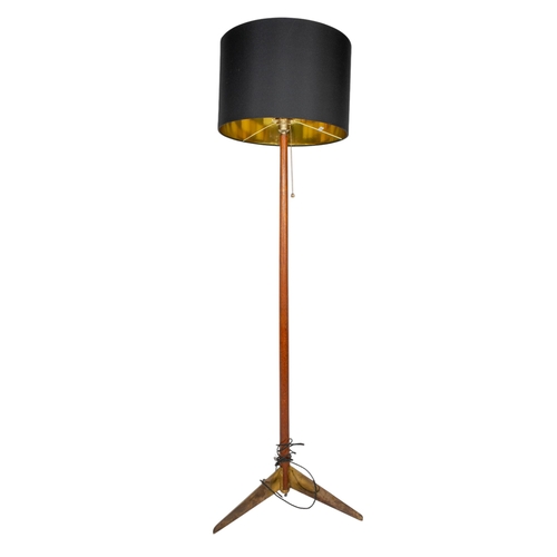 550 - Danishc.1950Teak and brass floor lampDimensions:55 in. (H)... 