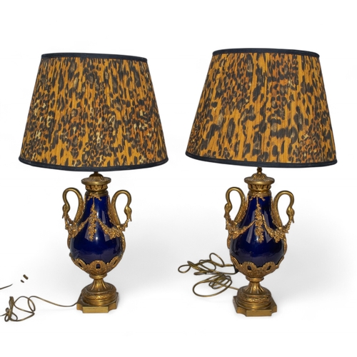 552 - French19th centuryA pair of cobalt and ormolu mounted lamps with contemporary leopard-print shadesDi... 