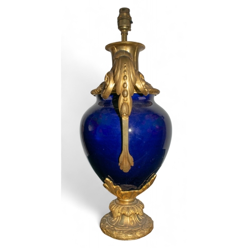 556 - Louis XVI styleA cobalt blue porcelain lamp with ormolu handles and mountDimensions:20 in. (H) x 11 ... 