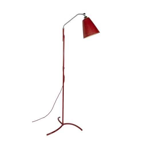 557 - Swedishc.1950sAn adjustable floor standing lampDimensions:49-65 in. (H)... 