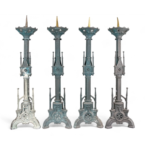 560 - ContinentalNeo-GothicFour large brass pricket candlesticksDimensions:34.5 in. (H)... 