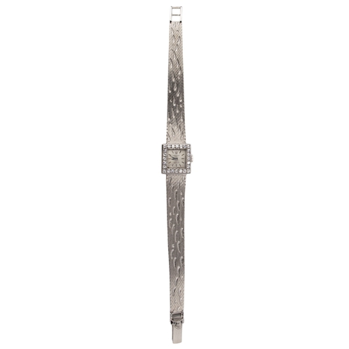 59 - SwissRolexCirca 1960A lady's 18 carat white gold and diamond wristwatchWith the original boxWeight: ... 