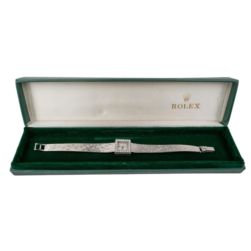 59 - SwissRolexCirca 1960A lady's 18 carat white gold and diamond wristwatchWith the original boxWeight: ... 