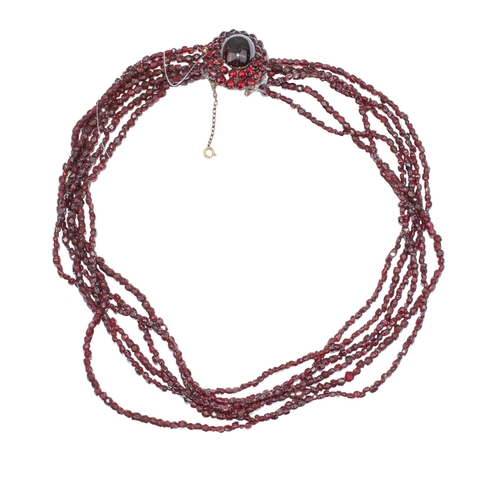 68 - BritishCirca 1880A Bohemian garnet necklaceComprising six rows of faceted Bohemian garnet beads, to ... 