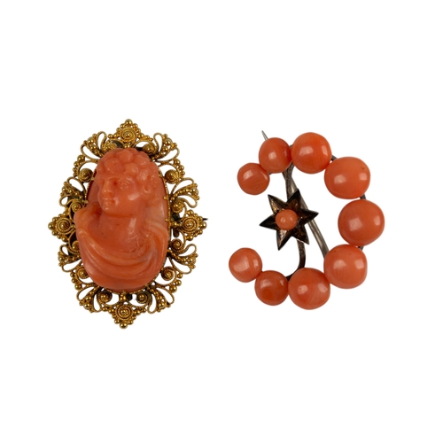 73 - ItalianCirca 1850Two carved coral brooches[a] A cameo brooch depicting the head of a classical Roman... 