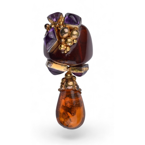 81 - Eileen CoyneContemporaryCirca 1980A large and unusual natural amber and amethyst pendant broochSigne... 