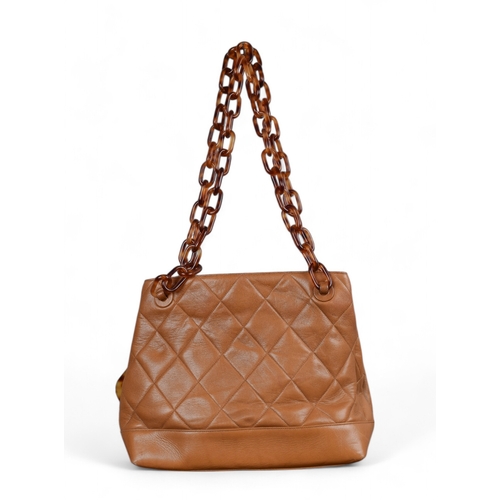 86 - Circa 1995, ChanelA caramel quilted lambskin CC shoulder tote bag with faux tortoiseshell handlesDim... 