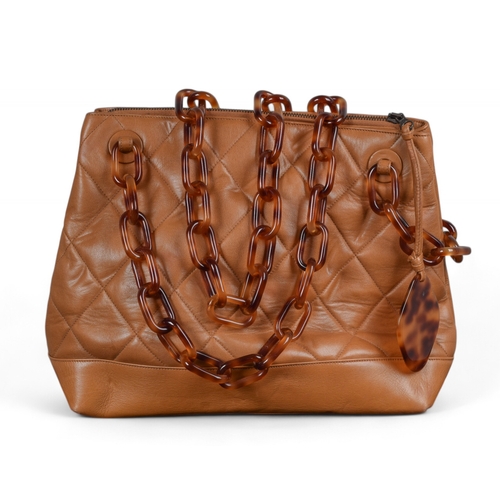 86 - Circa 1995, ChanelA caramel quilted lambskin CC shoulder tote bag with faux tortoiseshell handlesDim... 