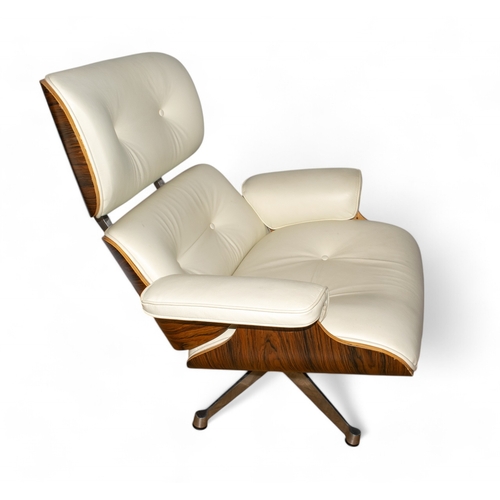 96 - After Charles EamesA white leather lounge chair and ottomanDimensions:28 in. (H) x 35 in. (W) x 27 i... 