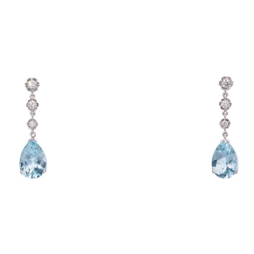 36 - ContinentalCirca 1980A pair of aquamarine and diamond pendant earringsThe pear shaped mixed cut aqua... 