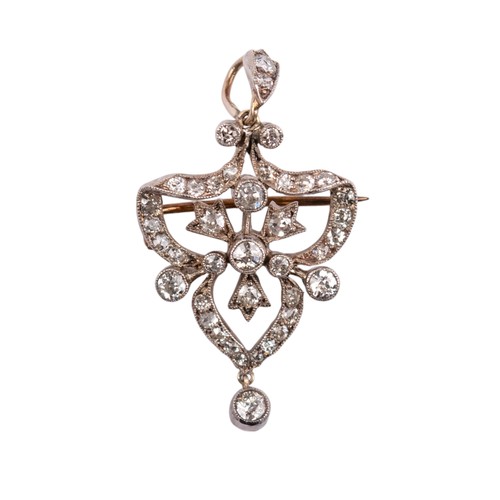 61 - BritishEdwardianCirca 1905-10A pretty diamond brooch pendantOf stylised trefoil design, with collett... 