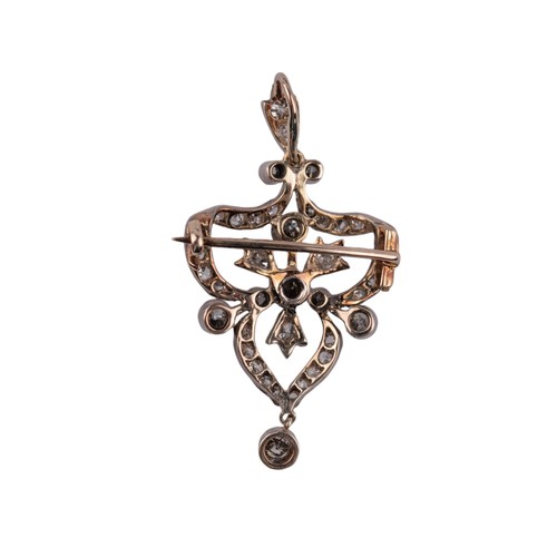 61 - BritishEdwardianCirca 1905-10A pretty diamond brooch pendantOf stylised trefoil design, with collett... 