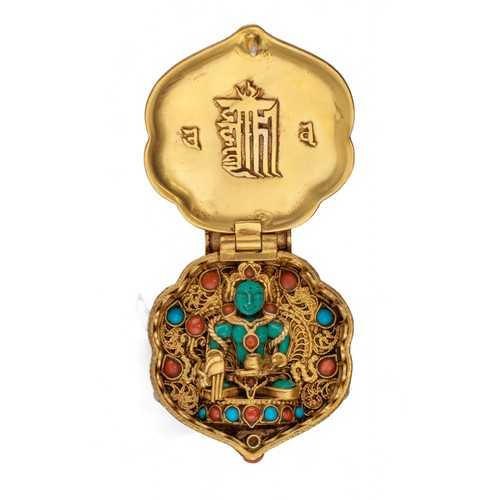 434 - Tibeto-Nepalese, 19th CenturyA ghau (travel amulet) in yellow gold on silver with turquoise and cora... 