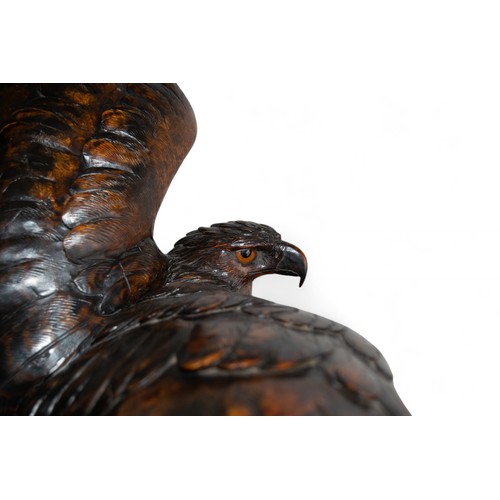 163 - Continental, 20th centuryA Black Forest carving of two eaglesDimensions:24 in. (H) x 21 in. (W)... 