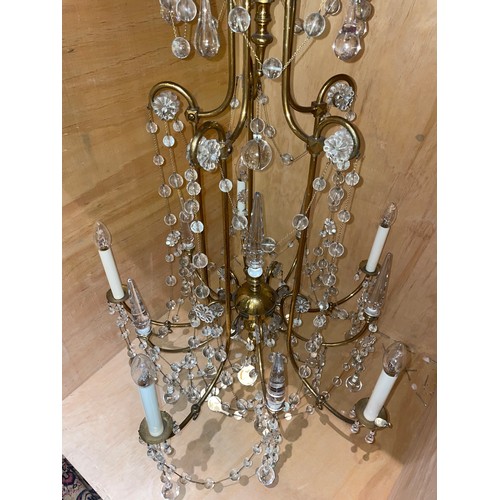 130 - Late 19th/Early 20th centuryA pair of five branch chandeliersLacquered brass and glassWith tubular s... 