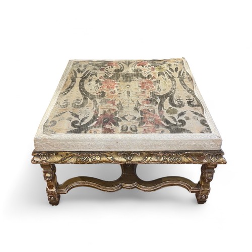 101 - BritishAntiqueAn early gilded table with 18th century tapestried topDimensions:18 in. (H) x 32 in. (... 