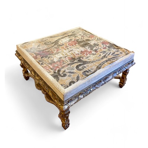 101 - BritishAntiqueAn early gilded table with 18th century tapestried topDimensions:18 in. (H) x 32 in. (... 