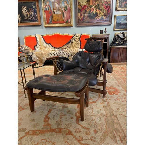 105 - Jean Gillon, Brazilianc.1960sA pair of jangada MCM Brazilian rosewood leather lounge chairs and otto... 