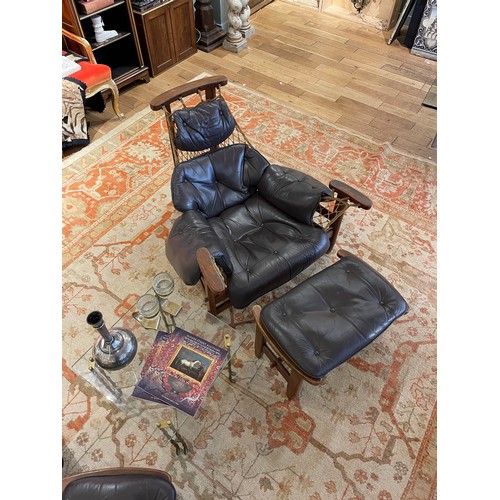 105 - Jean Gillon, Brazilianc.1960sA pair of jangada MCM Brazilian rosewood leather lounge chairs and otto... 