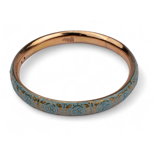 1 - British, Circa 1910A yellow gold and duck egg blue enamel bangle.The bangle finely decorated with fl... 